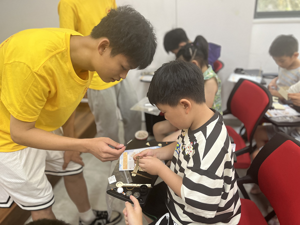 曙光社區(qū)開展“我愛湘潭我的家”科普潤童心手工活動