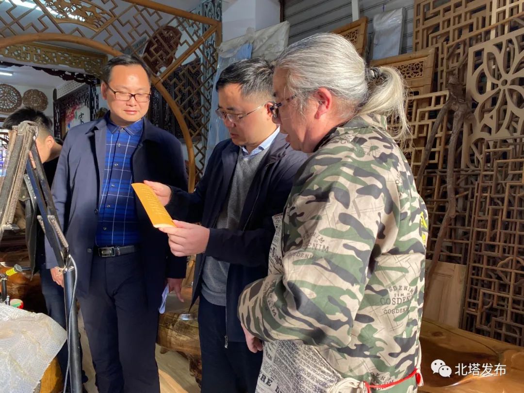 肖平走访我区新的社会阶层人士
