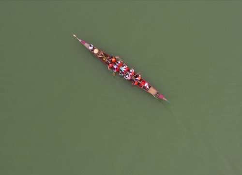 On the Miluo River: How one lady braves the wind and waves