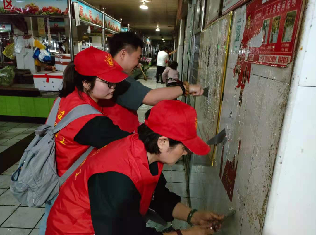 武陵区水利局 志愿者深入市场开展“我为群众办实事”