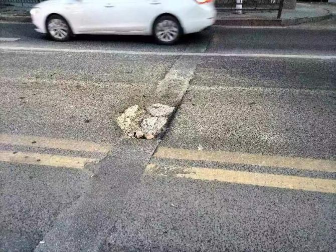 代表连热线 路坑变平整